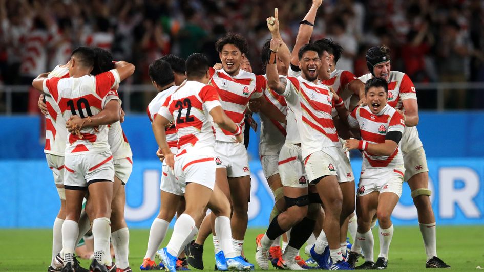 Japan celebrate their success over Ireland