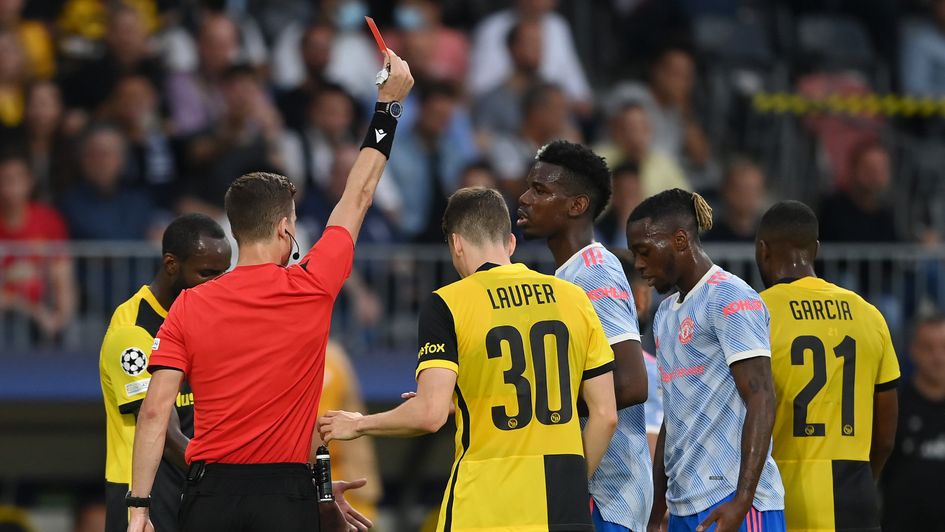 Aaron Wan-Bissaka is shown the red card against Young Boys