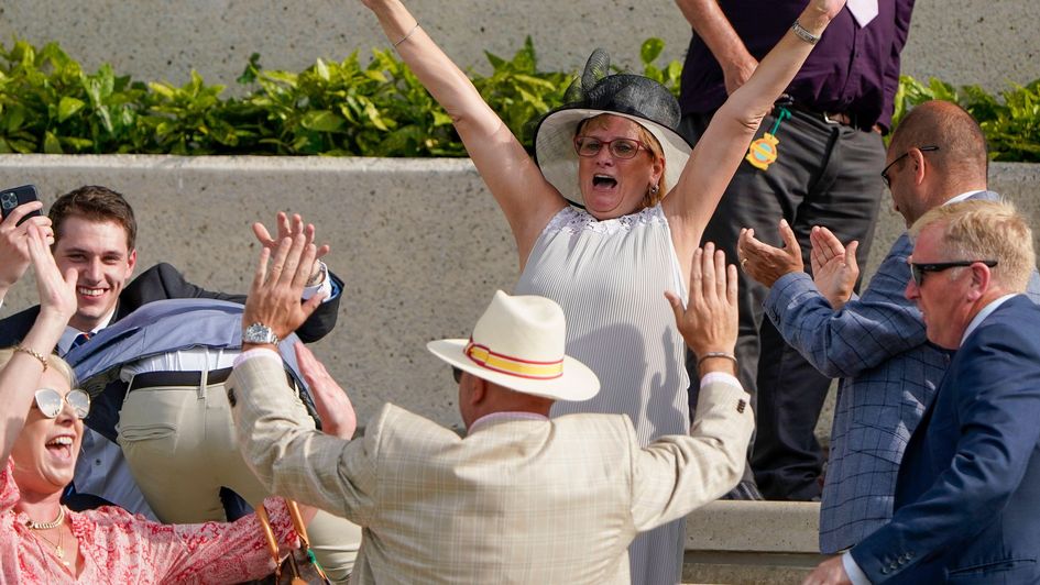 Members of a Middleham Park Racing syndicate celebrate a Goodwood winner
