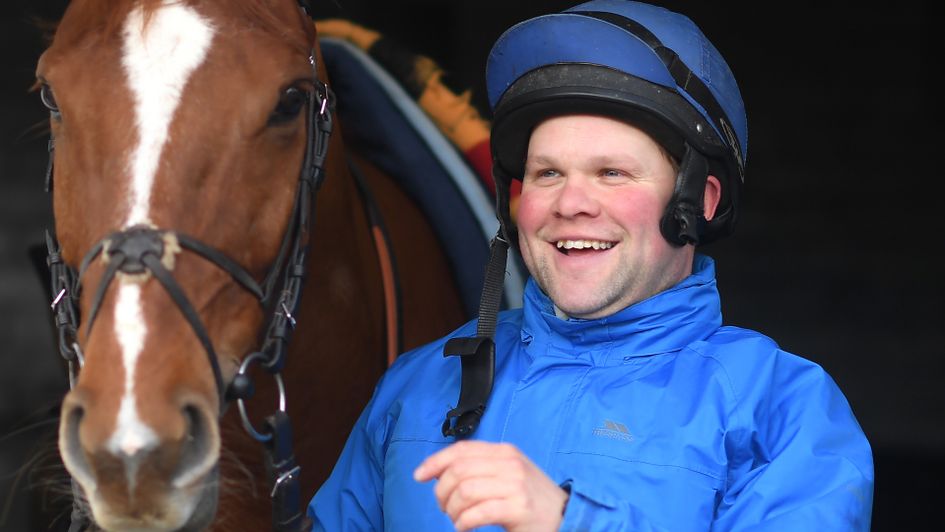 A stable lad prepares to exercise Son Of Camas