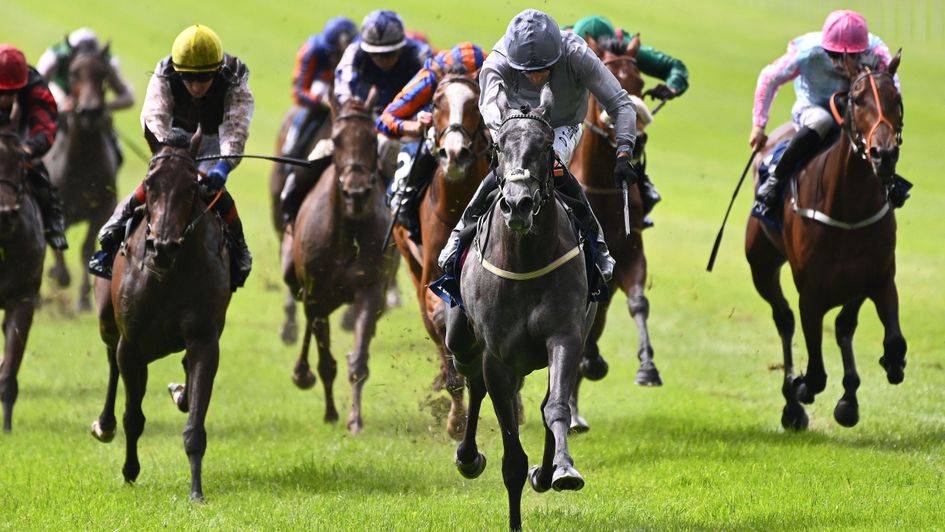 A Lillac Rolla (left) - finishes second in the Irish 1000 Guineas