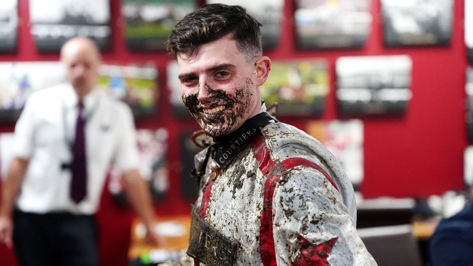 A mud-splattered James Turner at Cheltenham on Friday