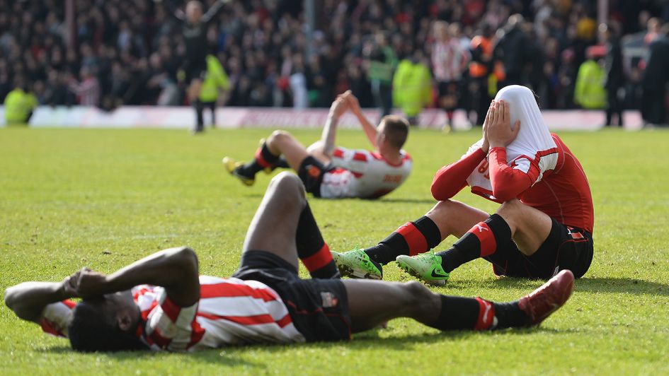 Brentford players react following defeat