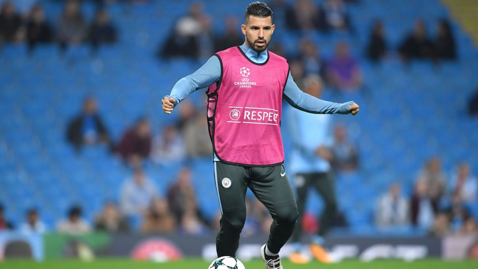 Sergio Aguero goes through a few drills before kick-off