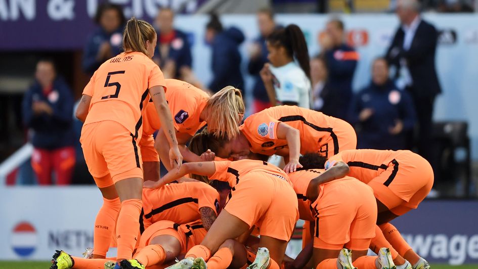 Netherlands celebrate Danielle Van De Donk's superb winner.