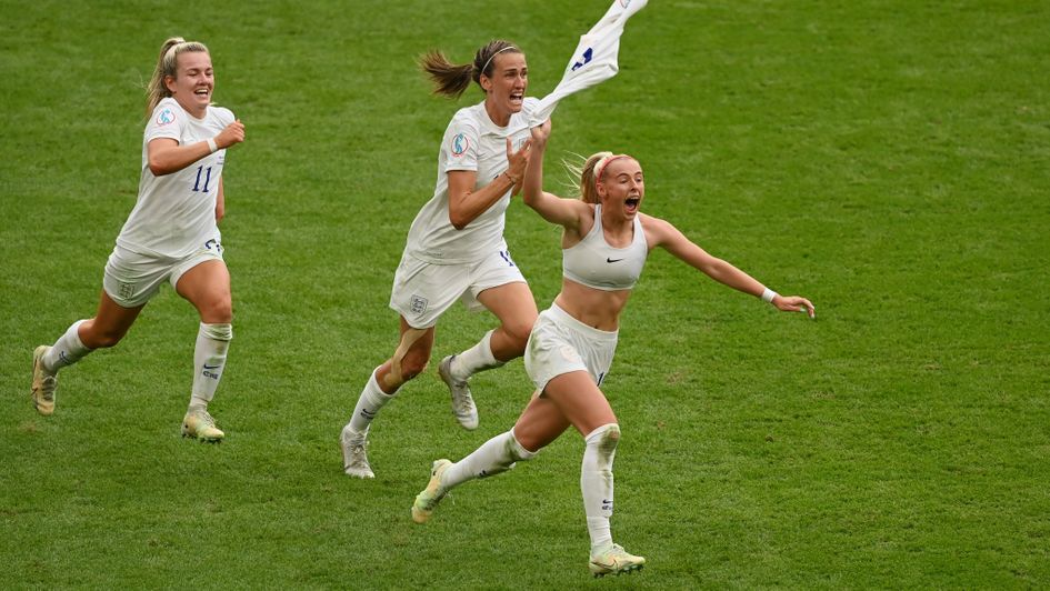 Chloe Kelly (right) celebrates scoring England's extra-time winner