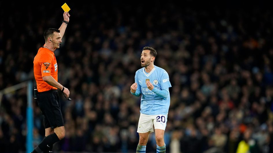 Bernardo Silva being carded