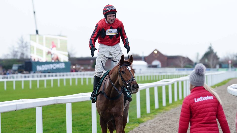 Harry Skelton celebrates on Midnight River