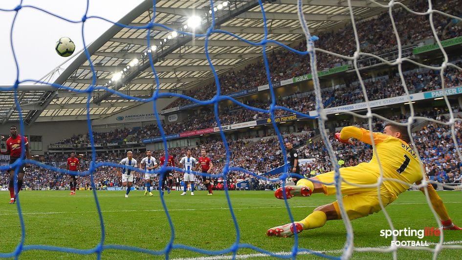 Paul Pogba scores his penalty against Brighton