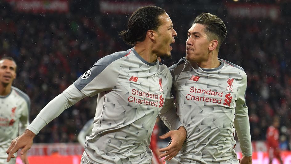 Virgil van Dijk (left) celebrates his goal for Liverpool, against Bayern in the Champions League, with Roberto Firmino