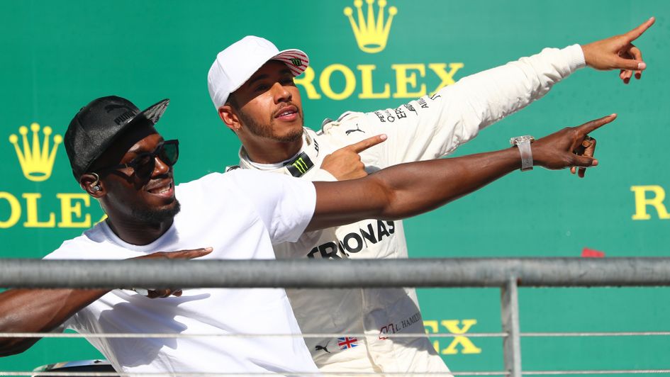 Usain Bolt and Lewis Hamilton celebrate