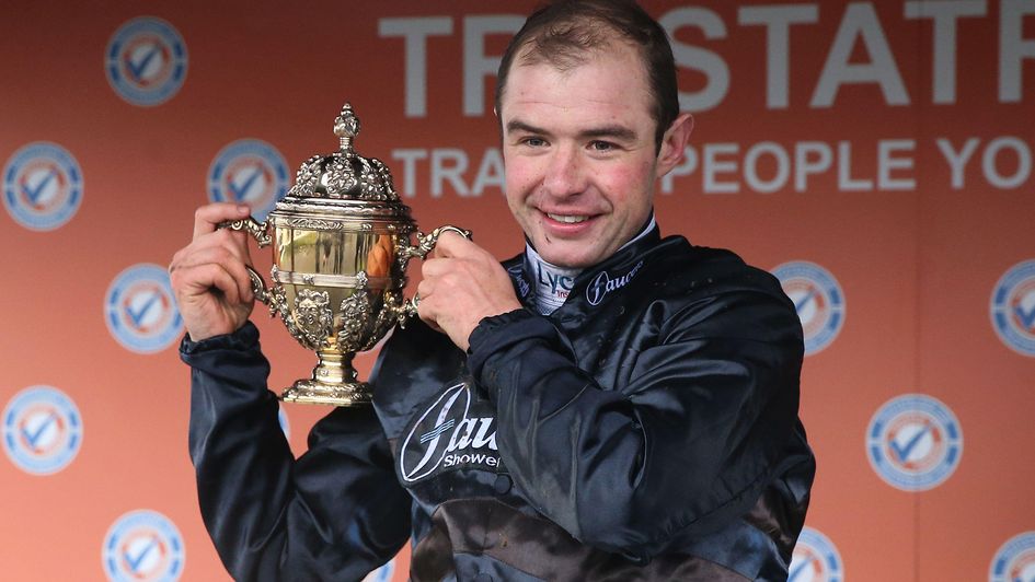 Charlie Deutsch with the trophy after Djelo's win in the Peterborough Chase