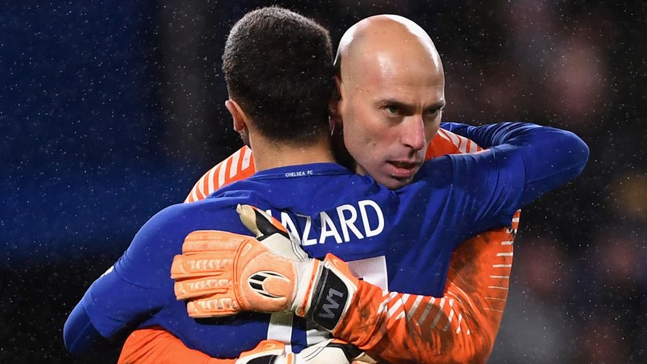 Goalkeeper Willy Caballero of Chelsea congratulates Eden Hazard