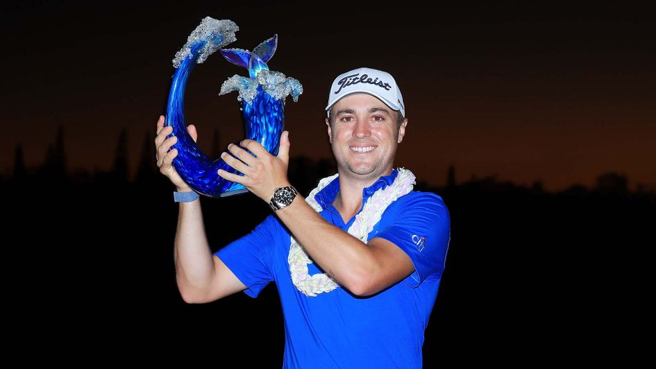Justin Thomas celebrates winning the Tournament of Champions in Hawaii