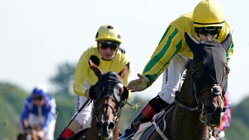 Colin Keane pats Mustajeer down the neck