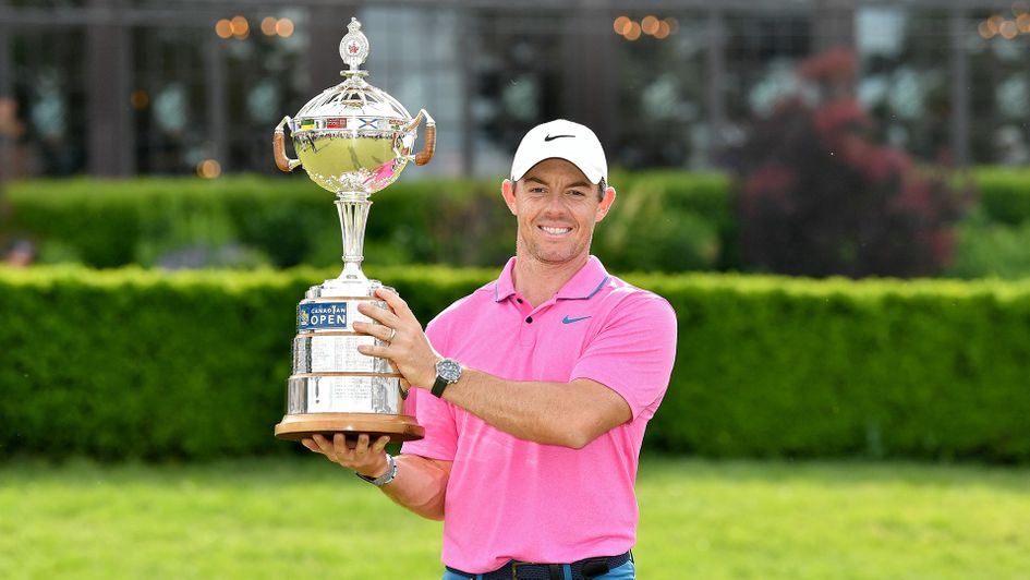 Rory McIlroy poses with the trophy after winning the RBC Canadian Open