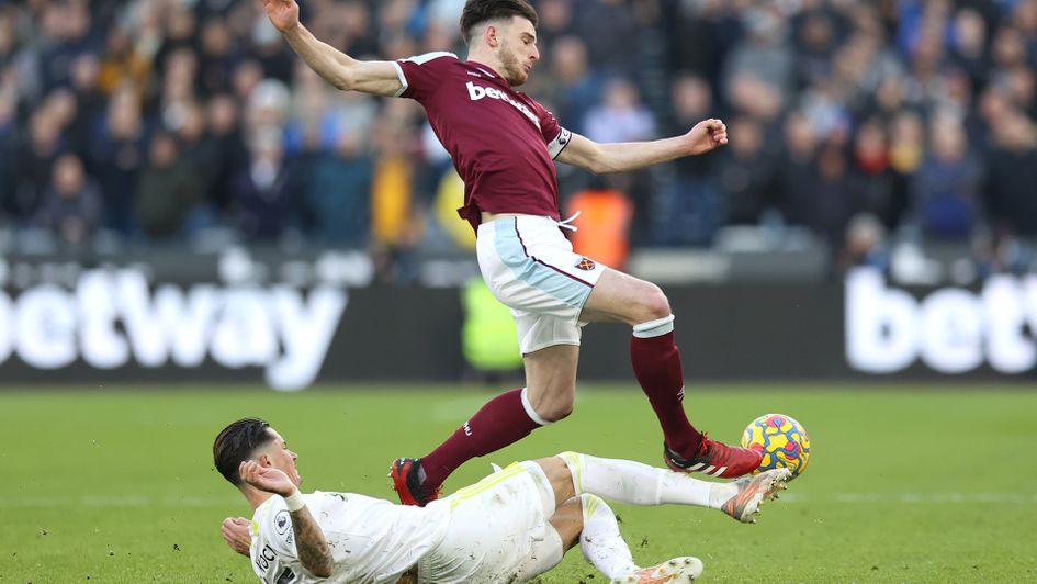Robin Koch tackles Declan Rice