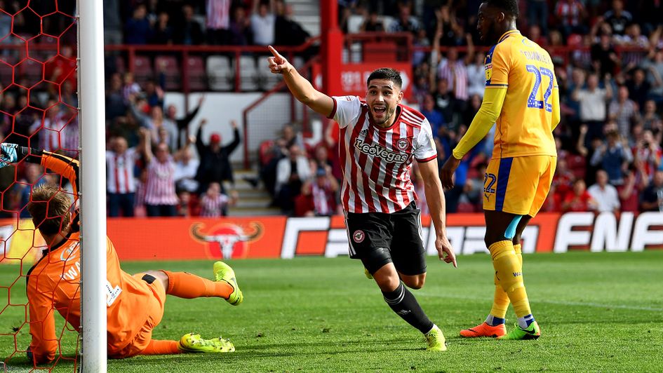 Neal Maupay celebrates after scoring against Wigan