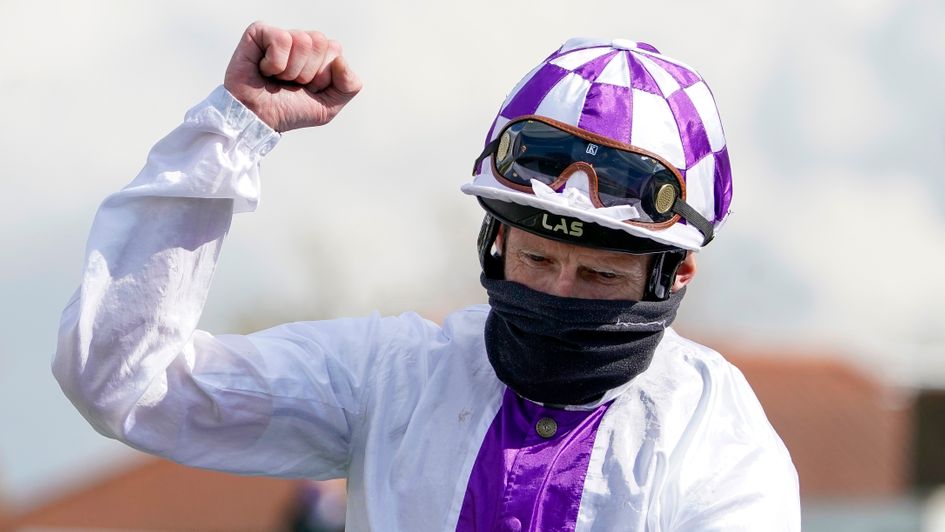 Kevin Manning celebrates Poetic Flare's victory