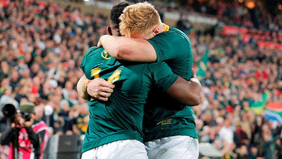 Sobusiso Nkosi (left) and Jean-Luc du Preez (right) celebrate South Africa's try v England