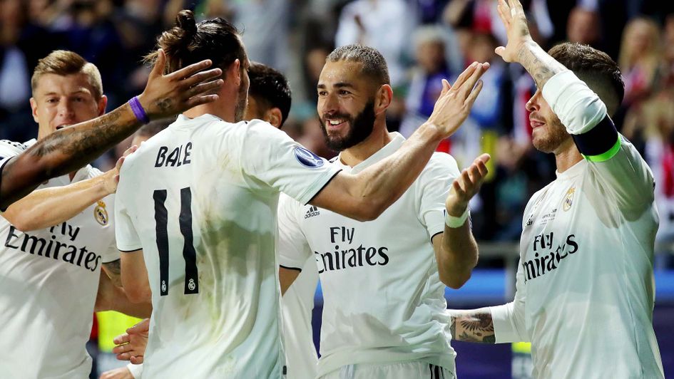 Real Madrid celebrate a goal against Atletico Madrid in the Super Cup