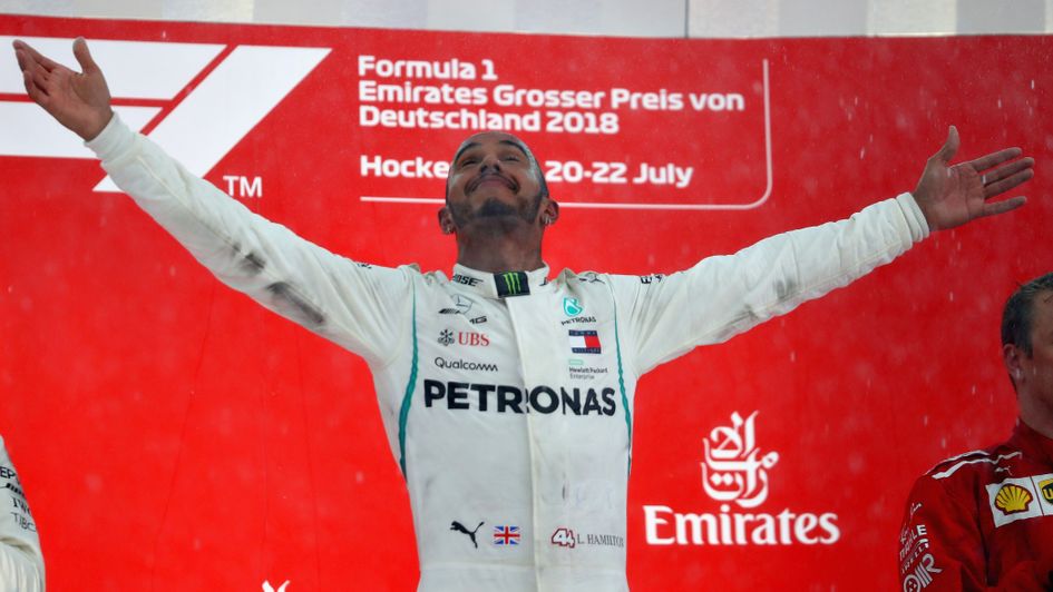 Lewis Hamilton celebrates a stunning win