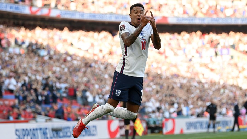 Jesse Lingard celebrates scoring England's opening goal against Andorra