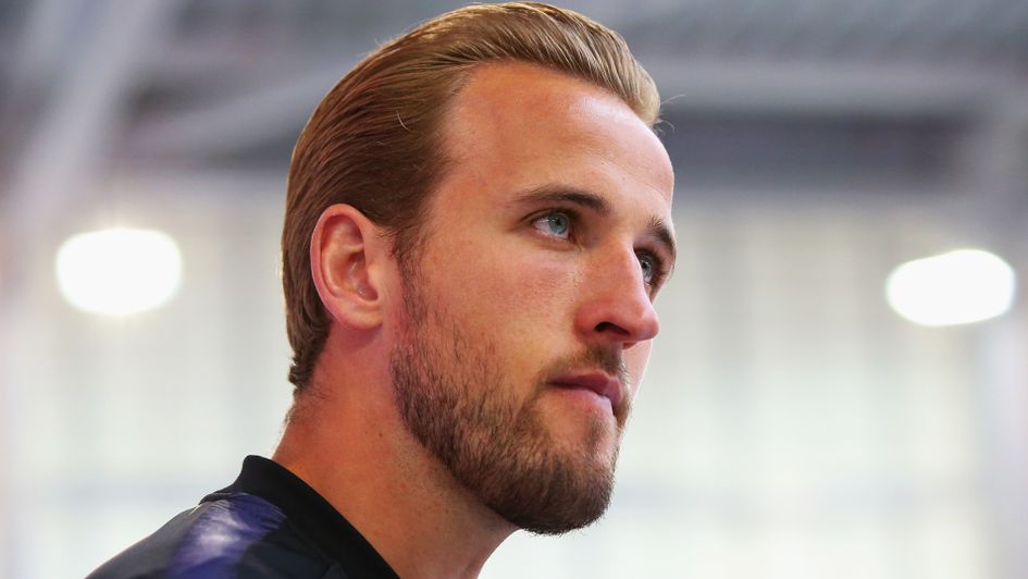 Harry Kane speaks to the media
