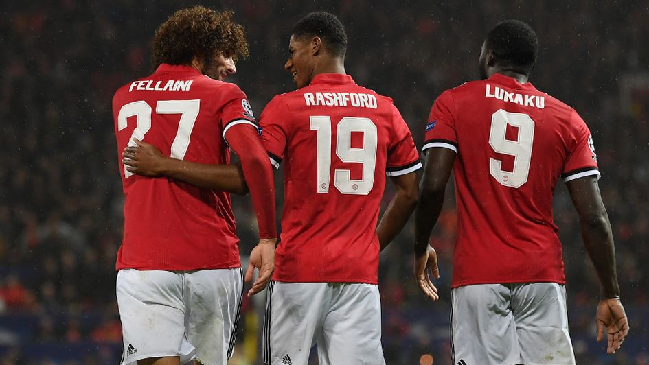 Manchester United's three goalscorers celebrate Marcus Rashford's goal