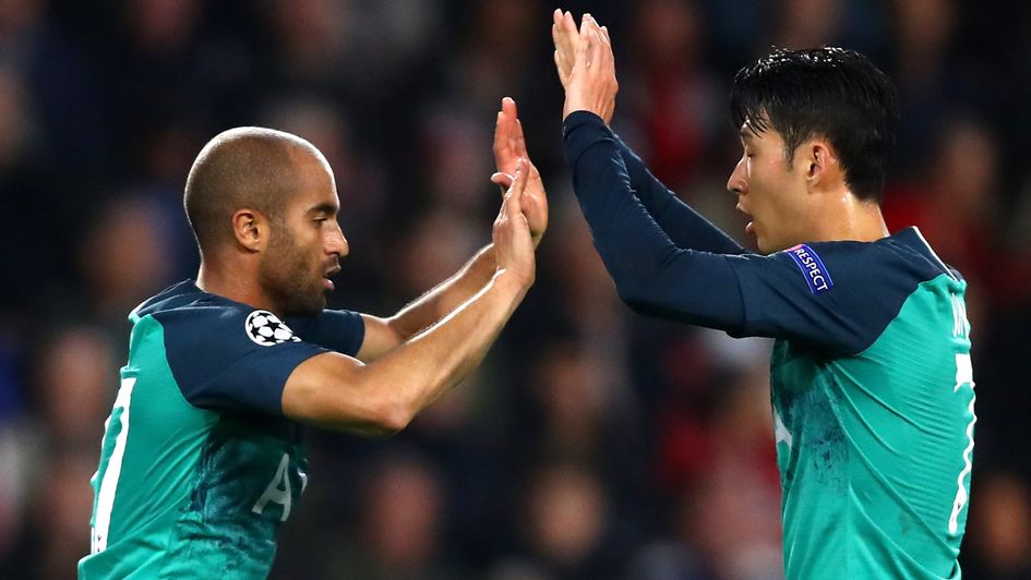 Lucas Moura and Heung-Min Son celebrate the former's goal in the Champions League
