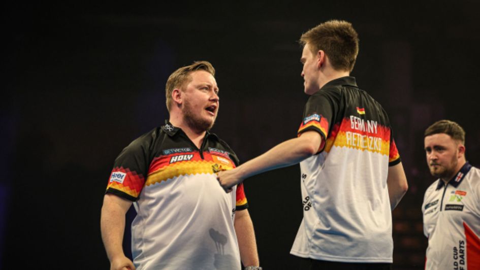 Germany celebrate as Littler looks on (Pic: PDC)