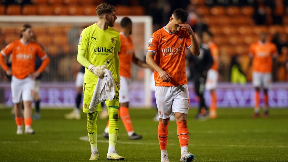 Blackpool's Jerry Yates and goalkeeper Daniel Grimshaw after their relegation was confirmed