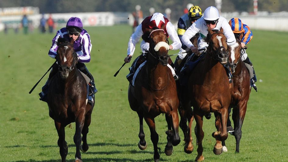 Camelot (left) powers home at Doncaster