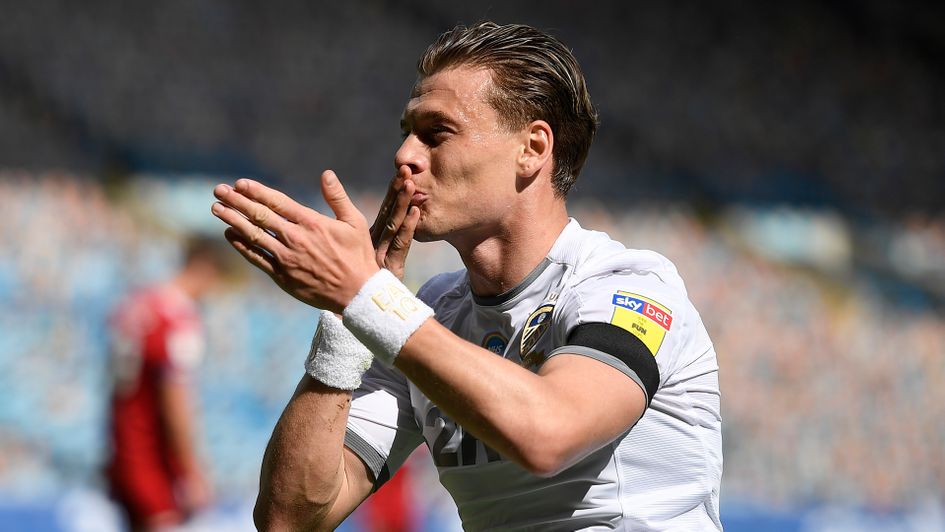 Ezgjan Alioski celebrates a goal for Leeds