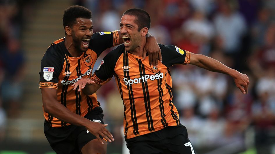 Evandro (right) celebrates scoring against Aston Villa