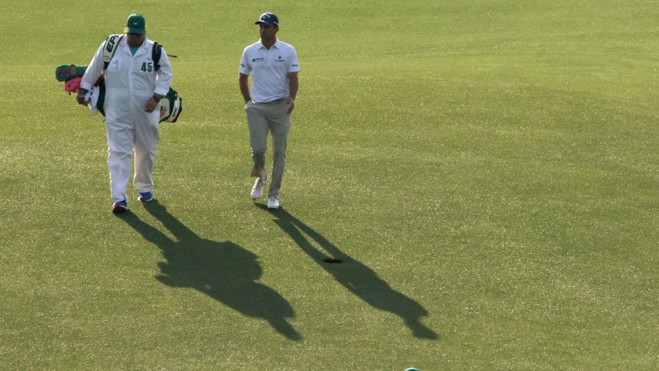 Kevin Kisner strides down the fairway on day one of the Masters