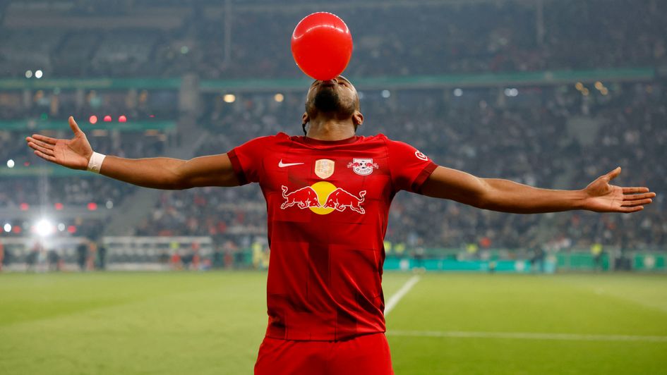Christopher Nkunku celebrates a goal for Leipzig
