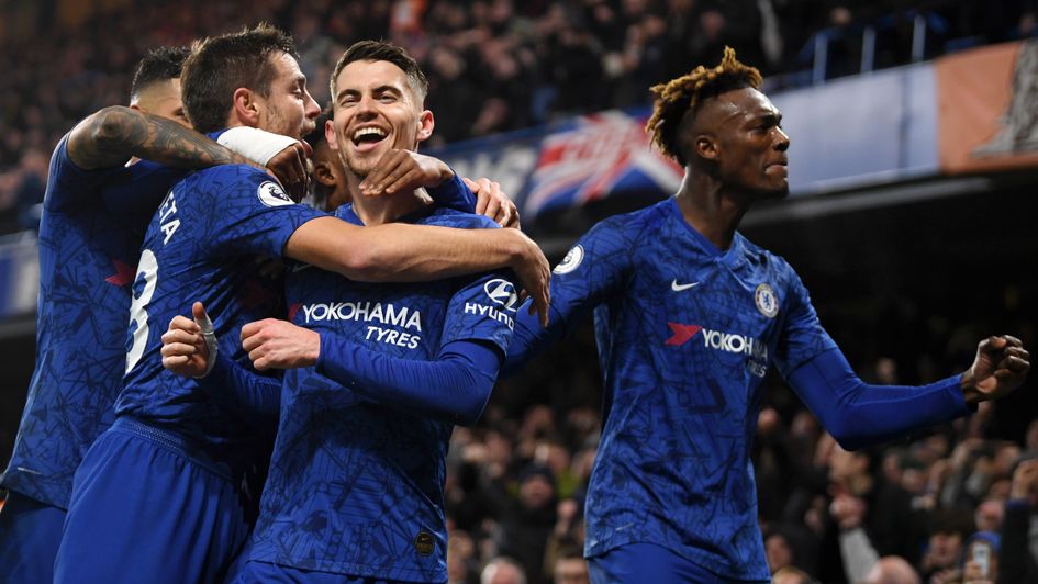 Chelsea celebrate Jorginho's (centre) penalty against Arsenal