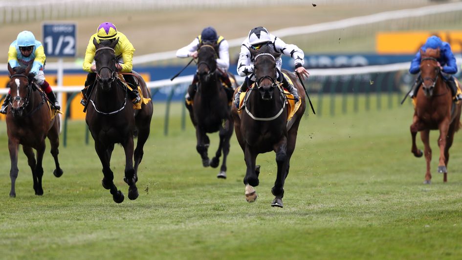 Mystery Angel (white and black silks) wins the Pretty Polly at Newmarket