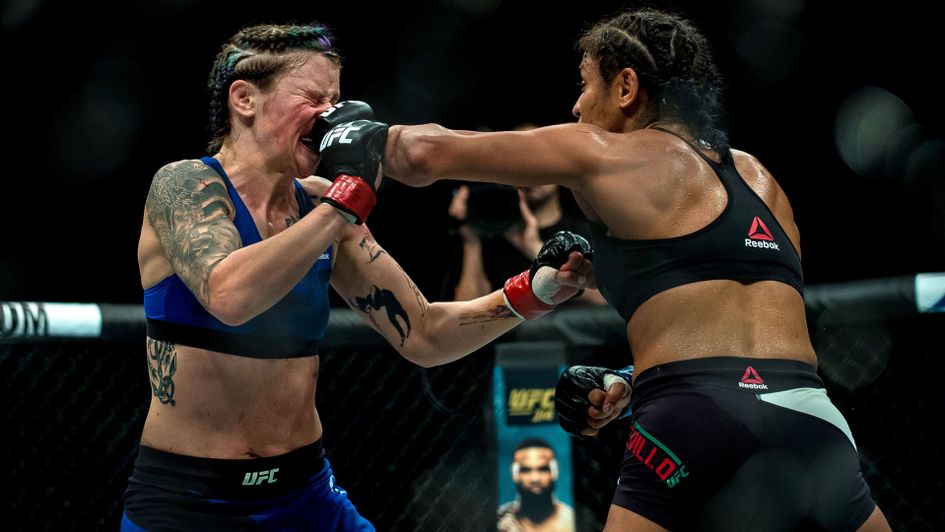 Joanne Calderwood (blue shorts) is defeated by Cynthia Calvillo