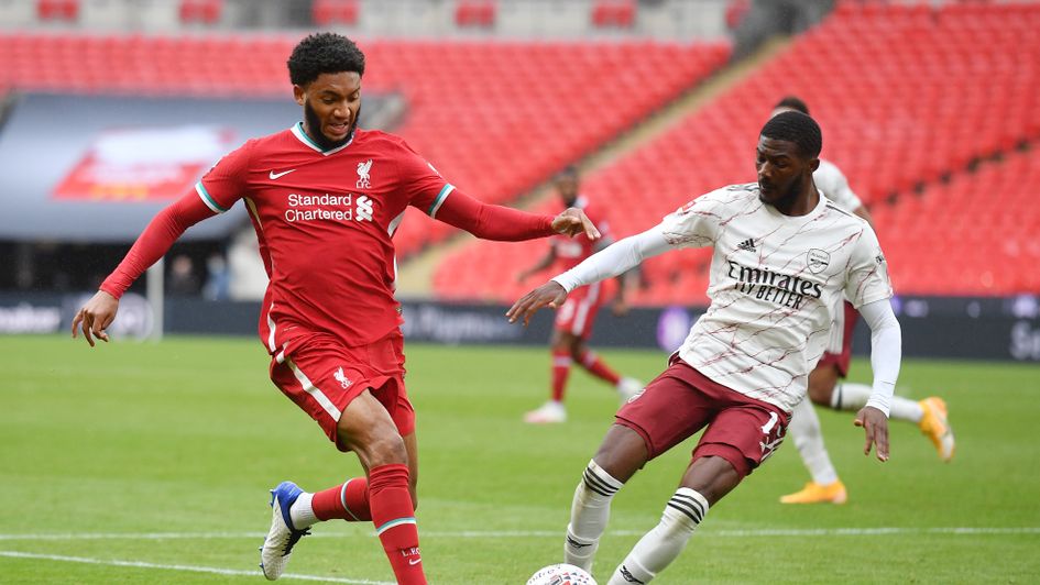 Arsenal's Ainsley Maitland-Niles (right) tackles Liverpool's Joe Gomez during the Community Shield