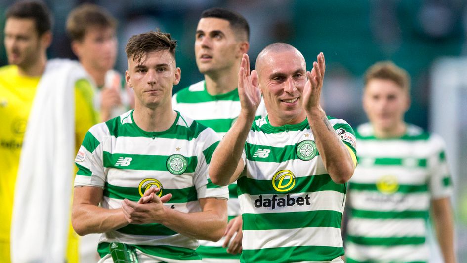 Celtic's Scott Brown applauds the fans