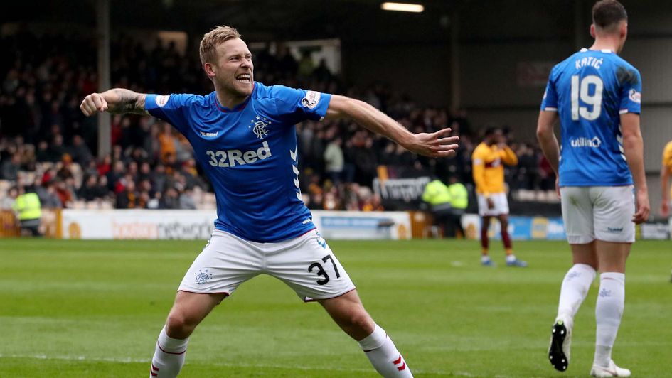 Scott Arfield celebrates for Rangers