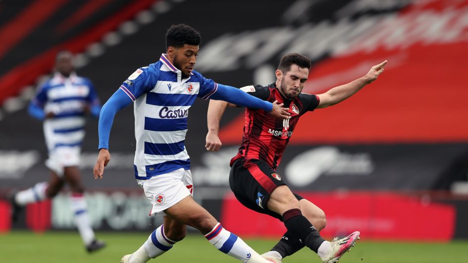 Reading's Josh Laurent and Bournemouth's Lewis Cook.