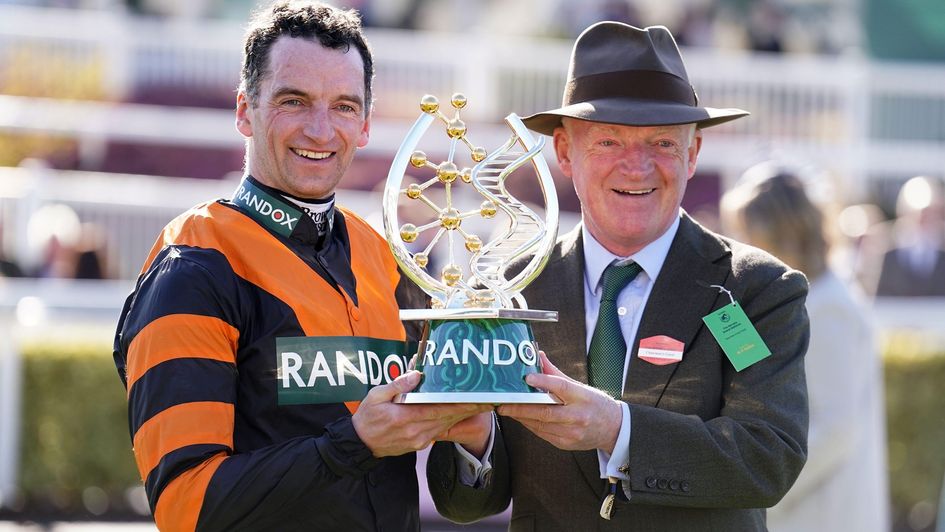 Patrick and Willie Mullins celebrate after Nick Rockett's Grand National victory