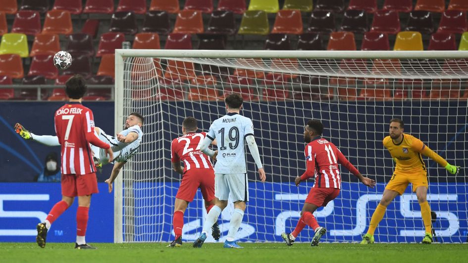 Olivier Giroud scores with an overhead kick against Atletico Madrid