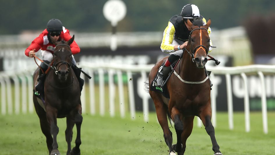 River Nymph ridden by jockey Adam Kirby (right) on their way to winning at Newbury