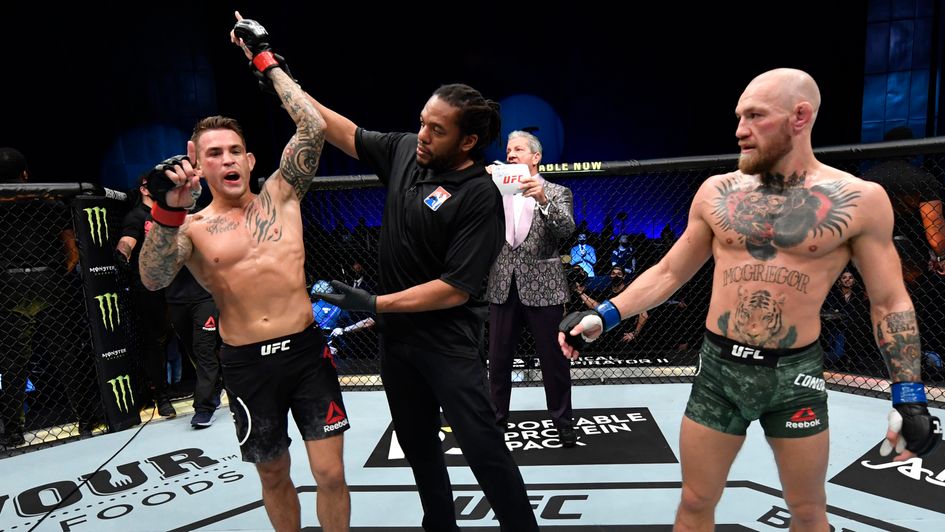 Dustin Poirier reacts after his knockout victory over Conor McGregor