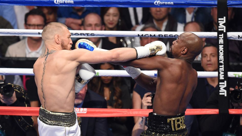 McGregor and Mayweather trade blows