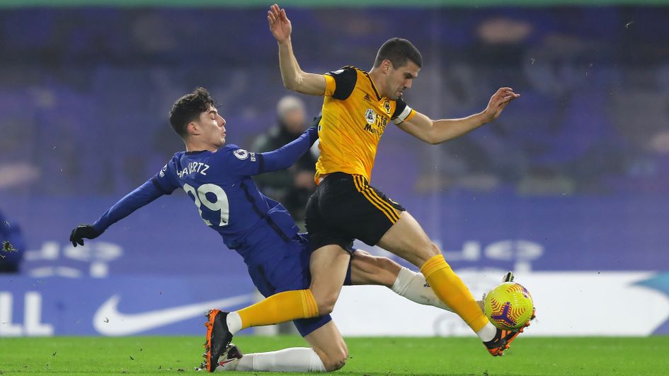 Chelsea's Kai Havertz and Wolves' Conor Coady battle for the ball